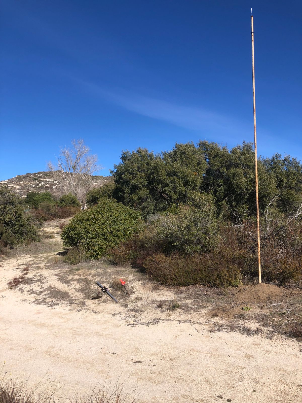 Hole 9 dogleg right mando left of pole