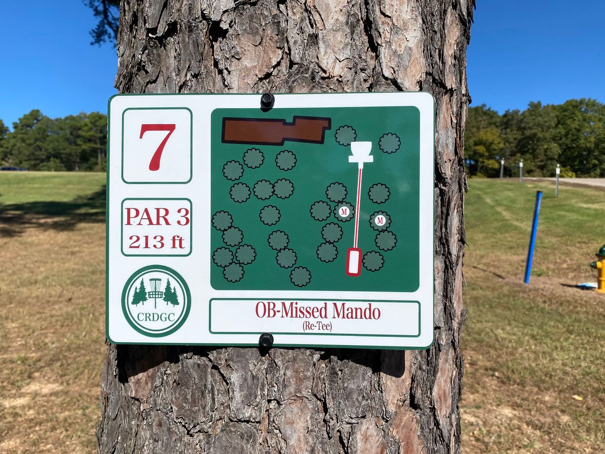 Hole 7 sign (red/white)