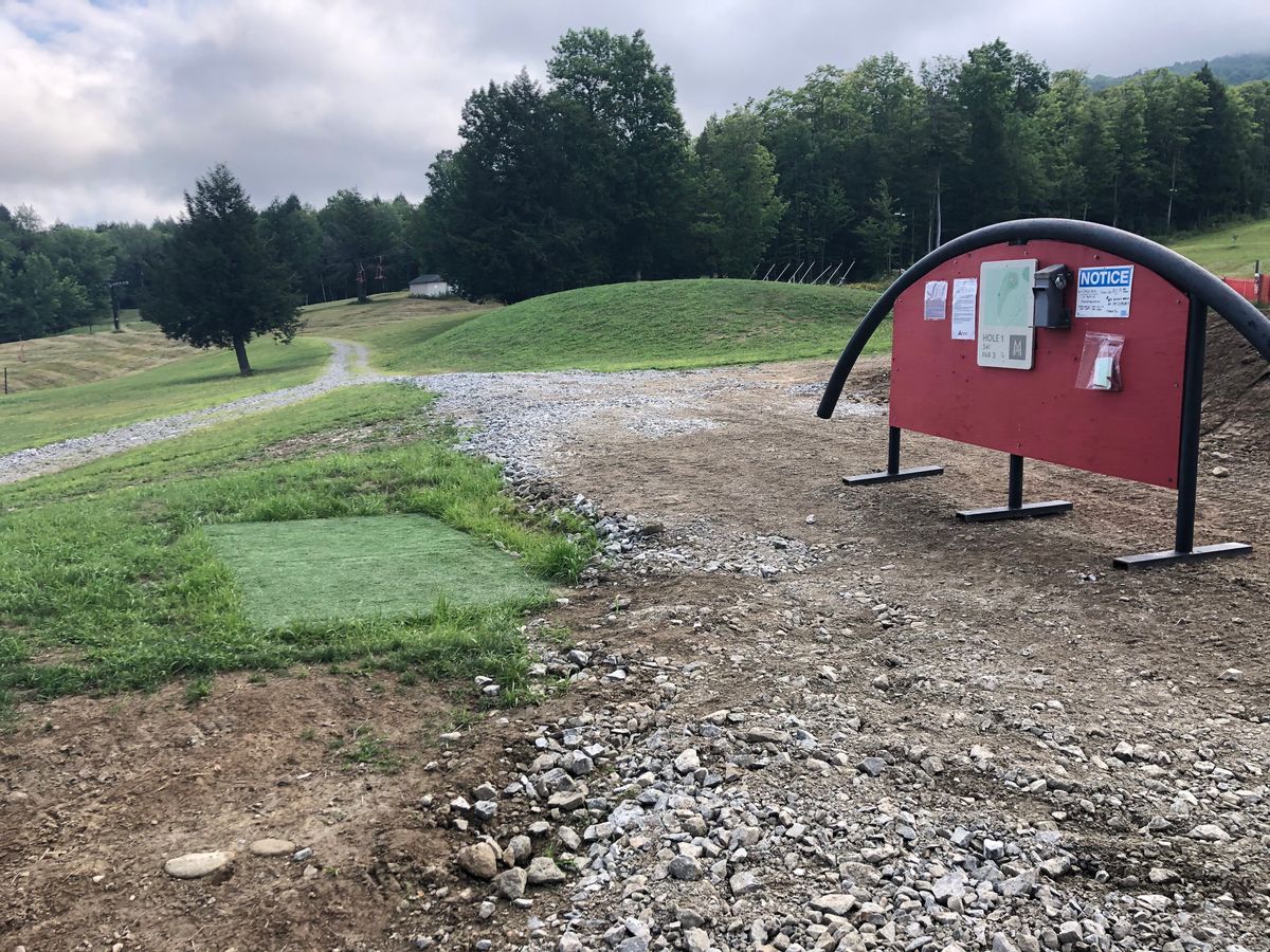 Hole 1, tee. New this year is this rail/info board.