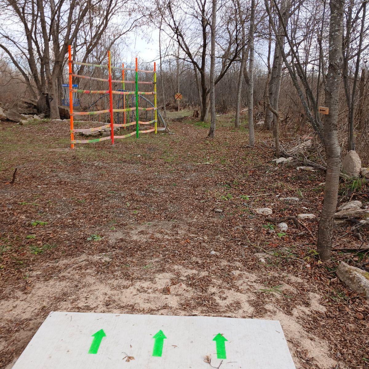 #16 tee, 159 ft. Slight dog leg to the left 