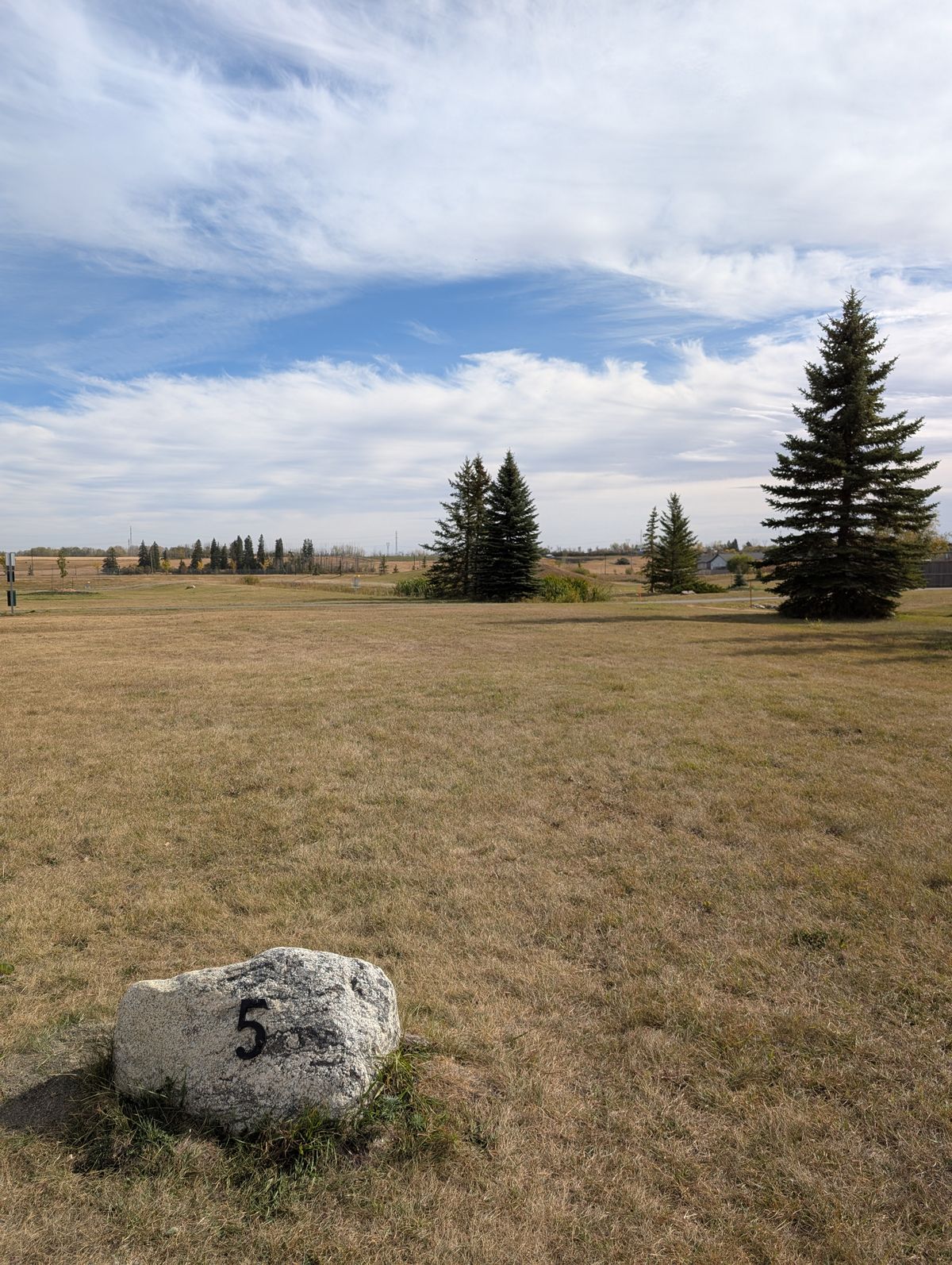 Hole 5. Canal is a hazard near the basket.