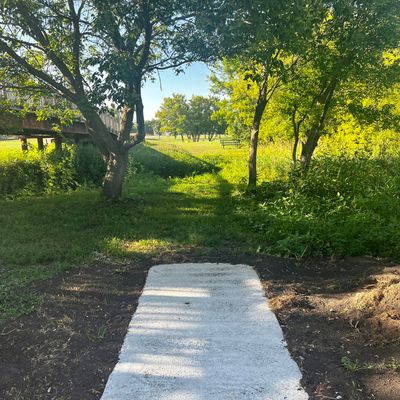 Hole 9 tee pad looking over river.