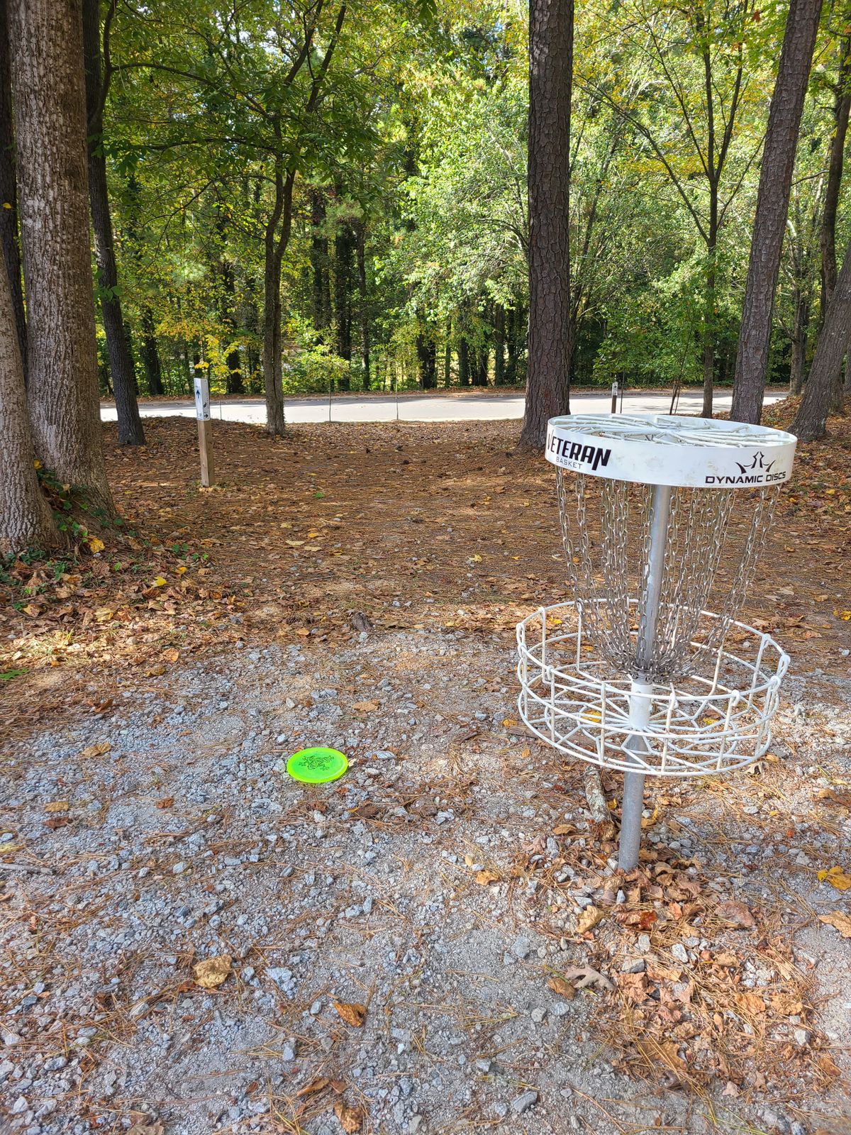 You can see the next directional sign from the white basket