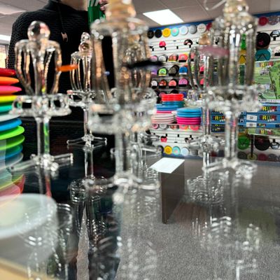 Glass disc golf baskets