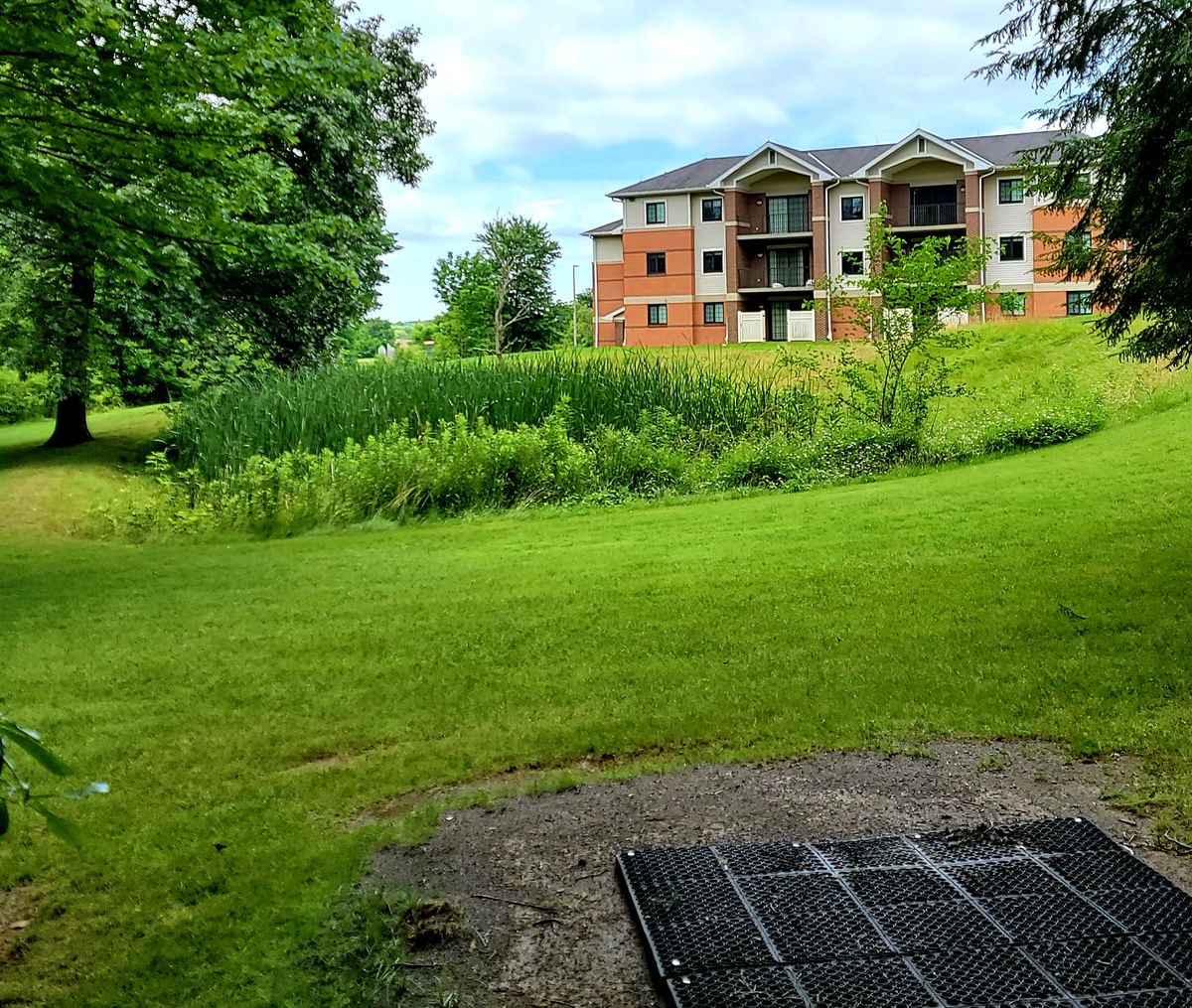 18th Hole tee behind  Rock apartments