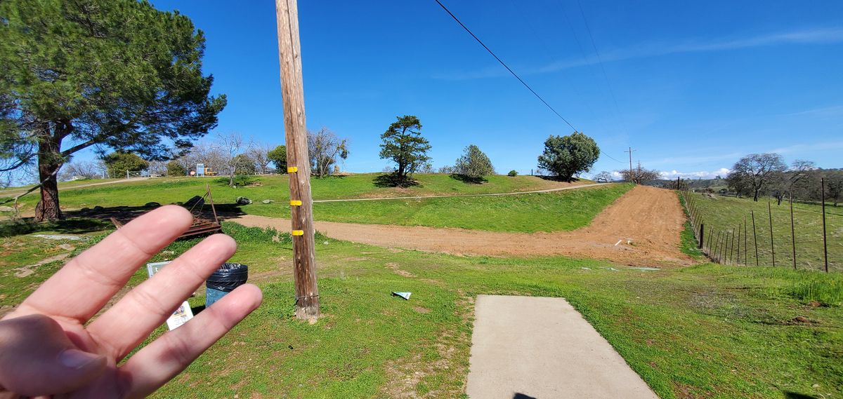Tee #3 - Straight shot.with uphill putting. Mid-range will set you up nicely.