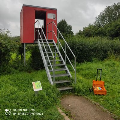 Tee 1 is the red hut.
