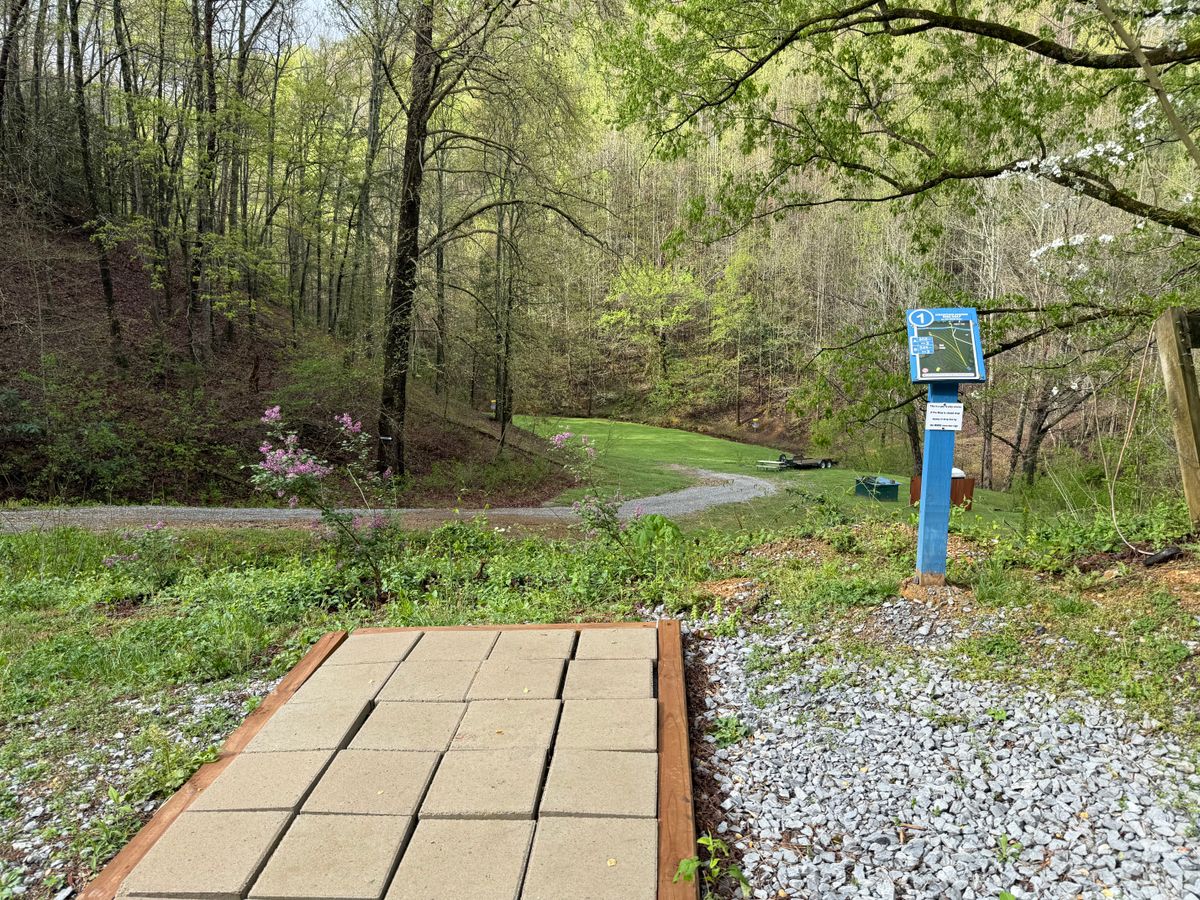 Hole one. Beautiful downhill! More open than most holes.
