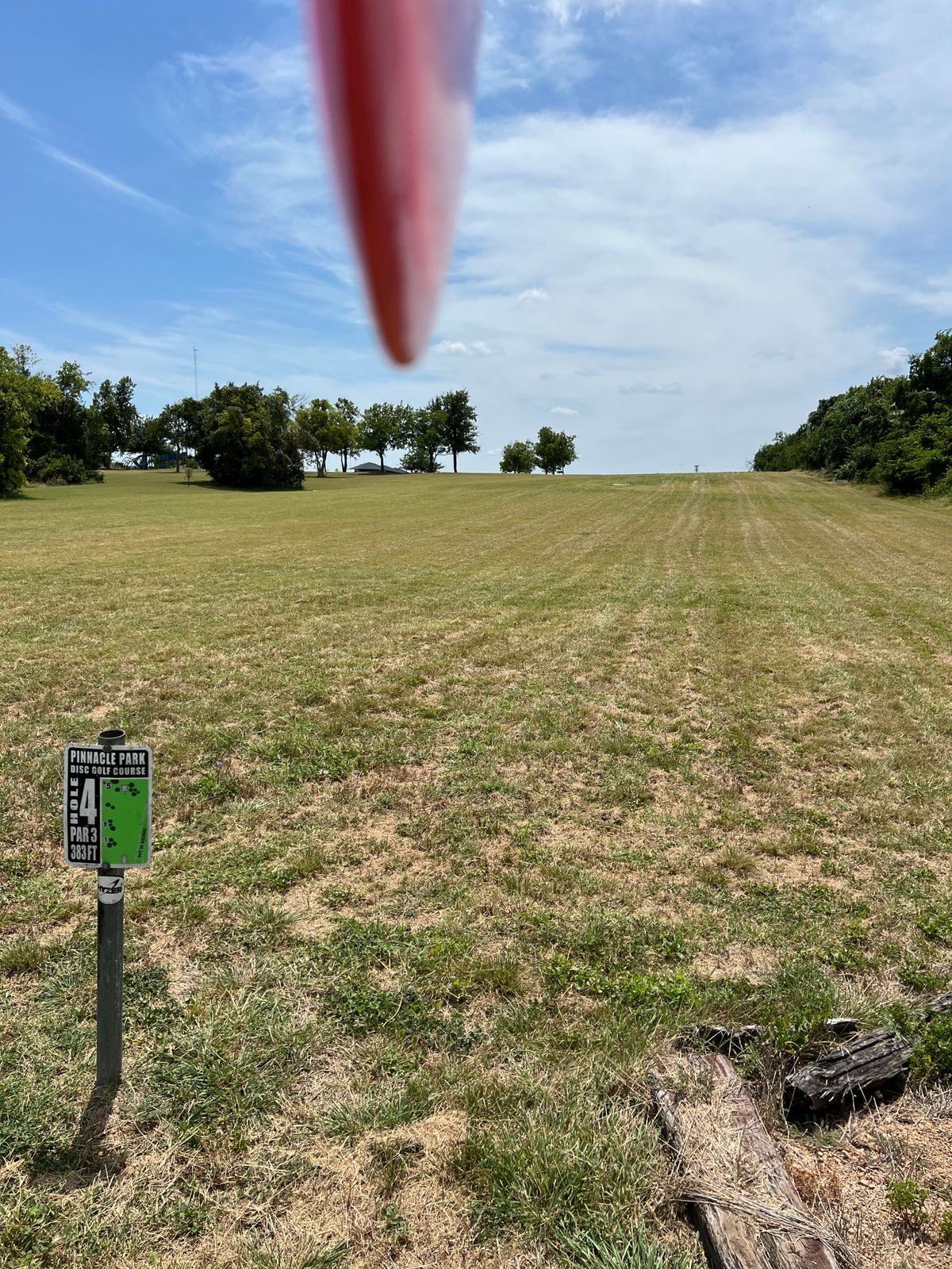 Hole 4 tee. The basket is below where the disc is pointing, NOT hole 9 basket.