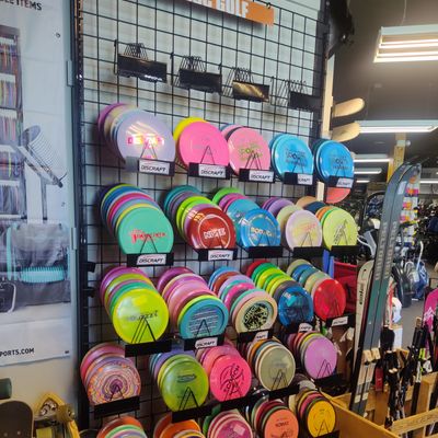One of two large sections! New Discraft, MVP, Axiom, Dynamic, Westside, Latitude 64, and Innova.   Also, large used budget disc bin.
