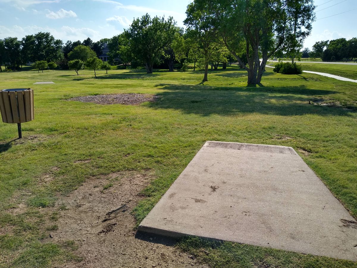 Concrete tees with numbers stamped in the concrete.