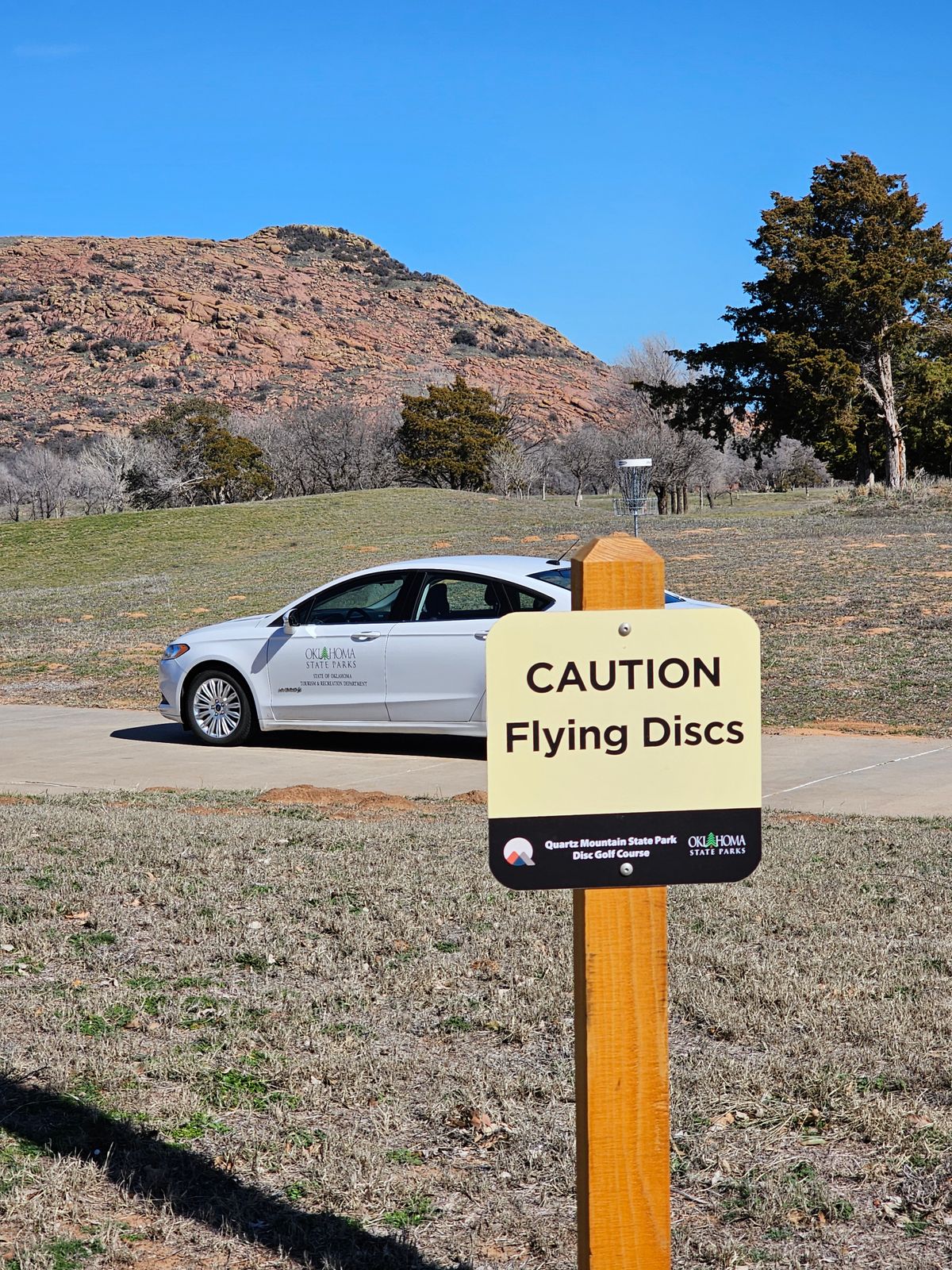 Open for enjoyment.   You may buy a parking pass for all state parks here.  Daily  and annual  available.   The
