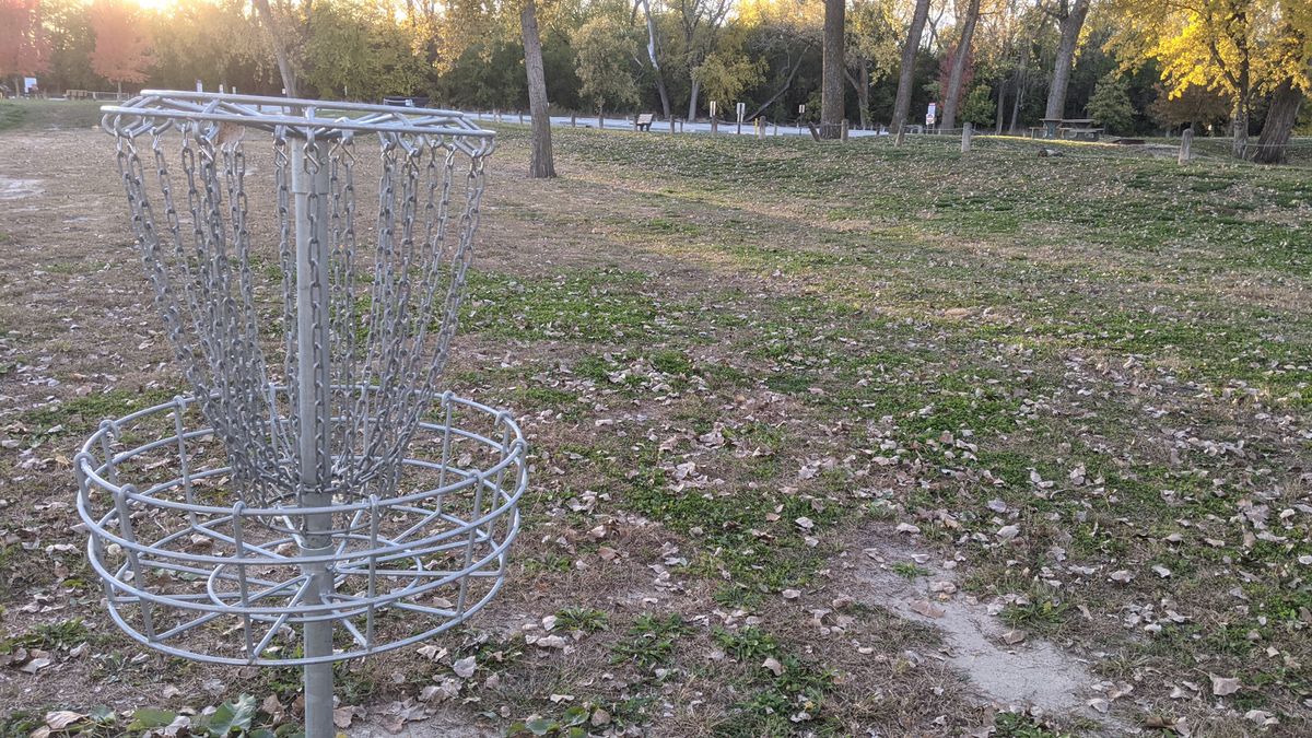 Tee #9. (Basket #8). Basket #9 was missing when I played.  Used the park bench for the hole.  Every hole has a park bench