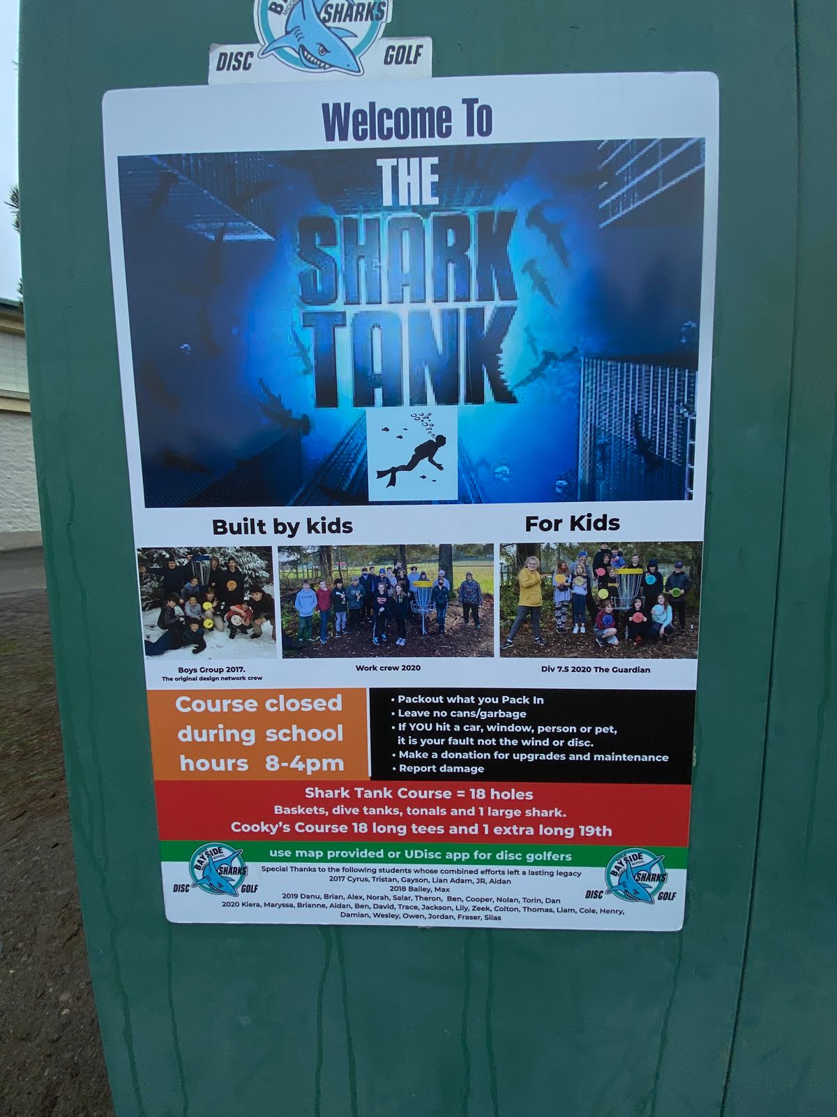 Welcome sign near hole 1 - with photos of the students who built the course