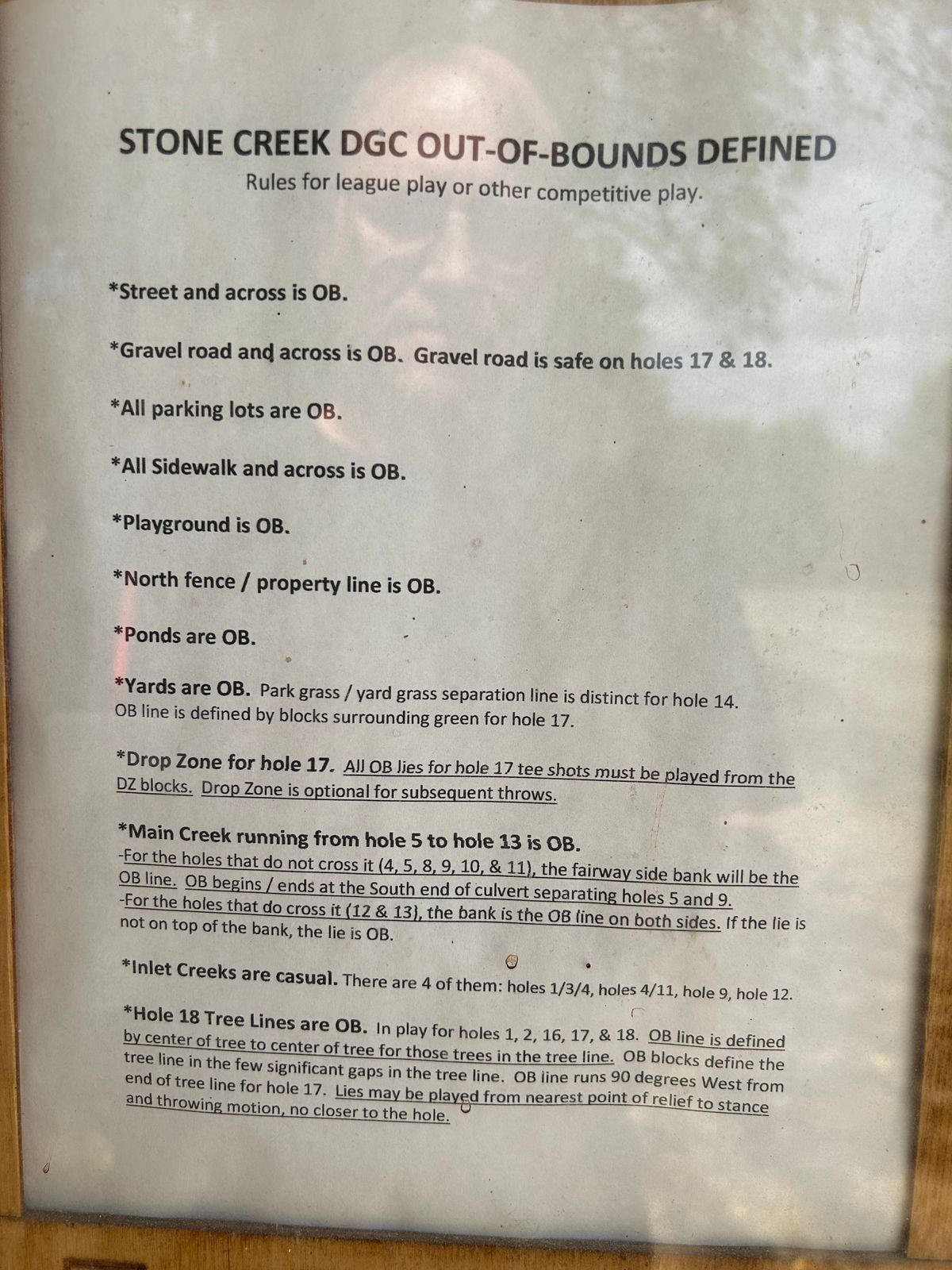 OB and other course rules posted on the back of the welcome sign