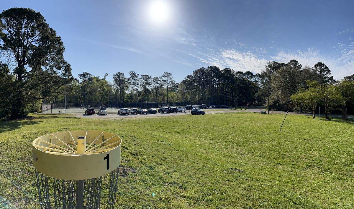 View from finish of hole 1.  Pickle ball club was in full swing at tennis courts this weekday.