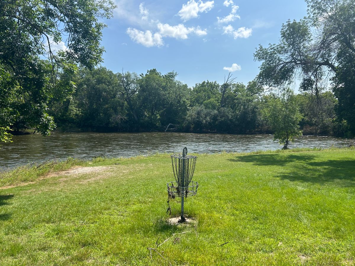 Hole 3 basket, by the river