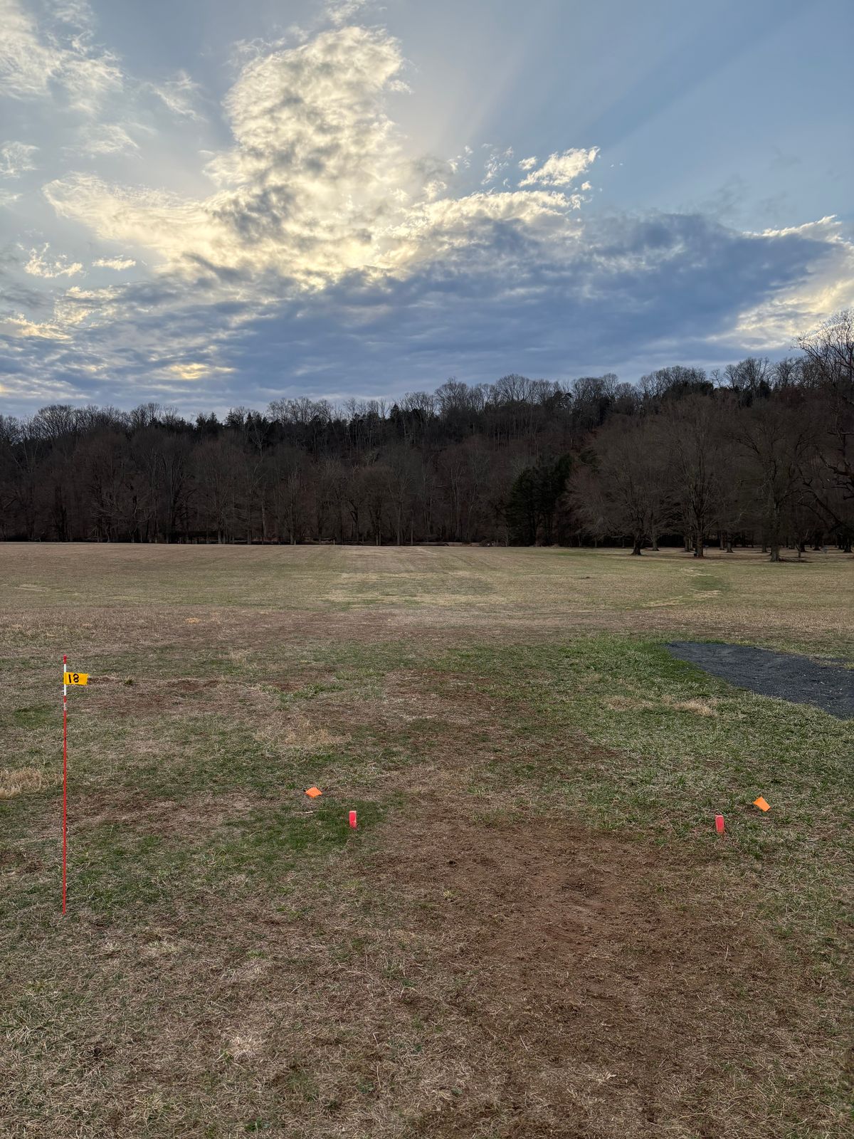 Proposed hole 18 tee is direct back left of the gravel pad.