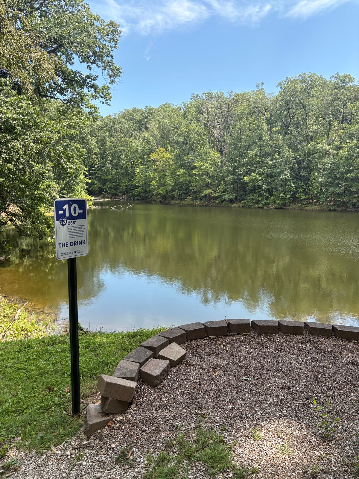 Hole 10 marker, take a stroke penalty and shot from here if you want.