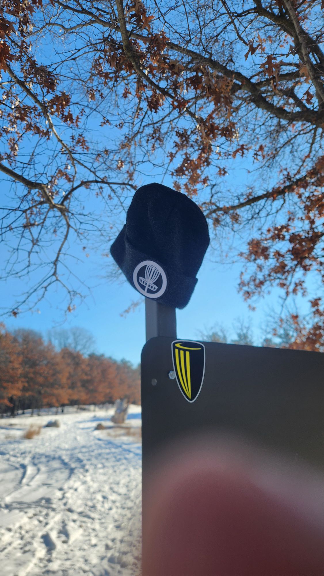 Found hat on 18 in the woods today. Left on sign at 1 tee pad