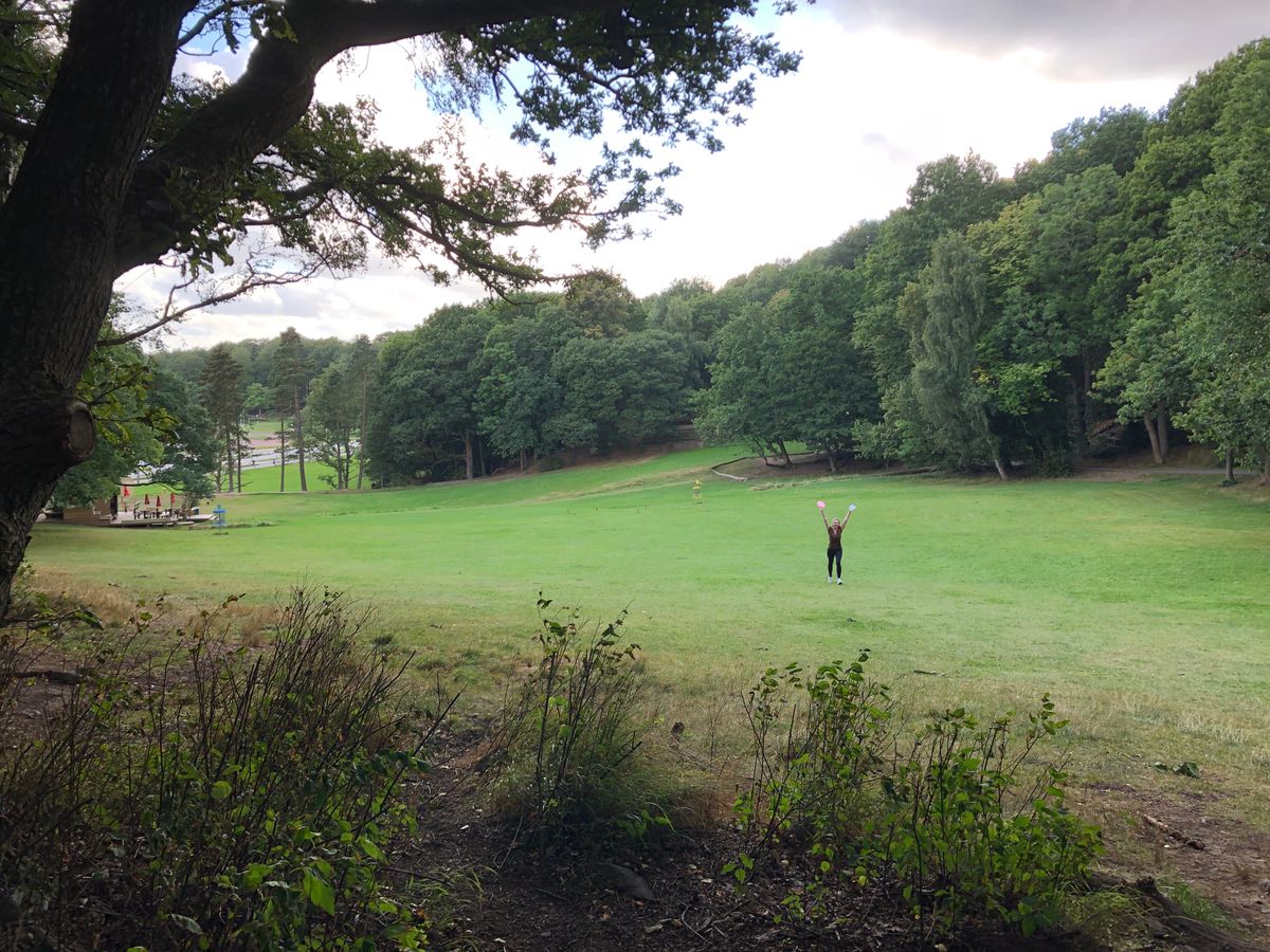 Yellow course hole 22, club house on left, other holes in distance