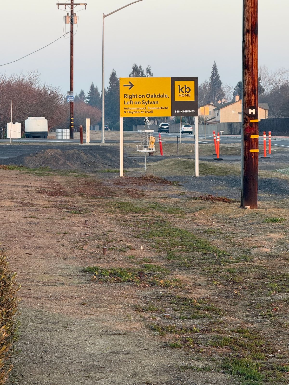 Hole #11 basket, mando left of telephone pole