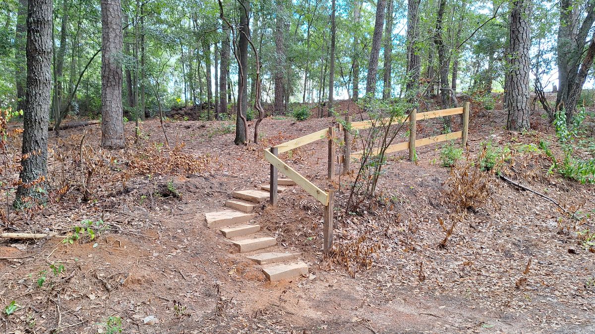 Hole #2 stairs in fairway.