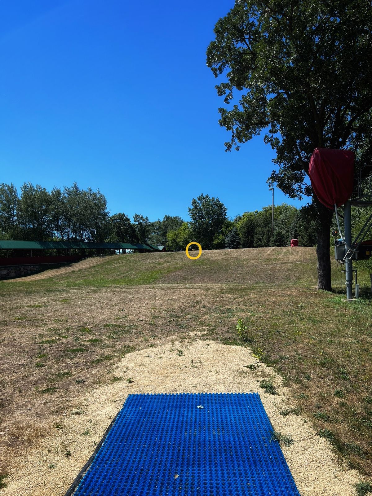 Hole 4 - Plays up the tubing hill. From the tee, the pin can be seen peeking over the top.
