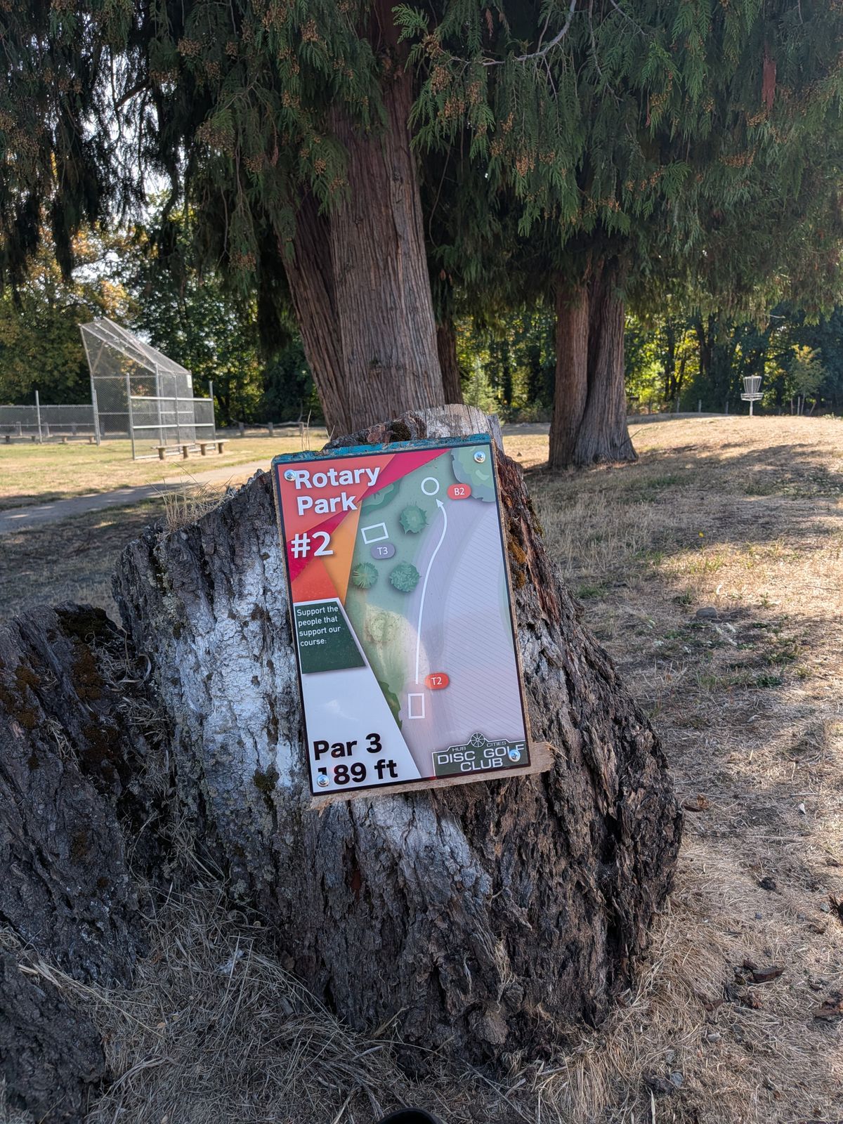 Teesign 2 on the stump that is M for hole 1.