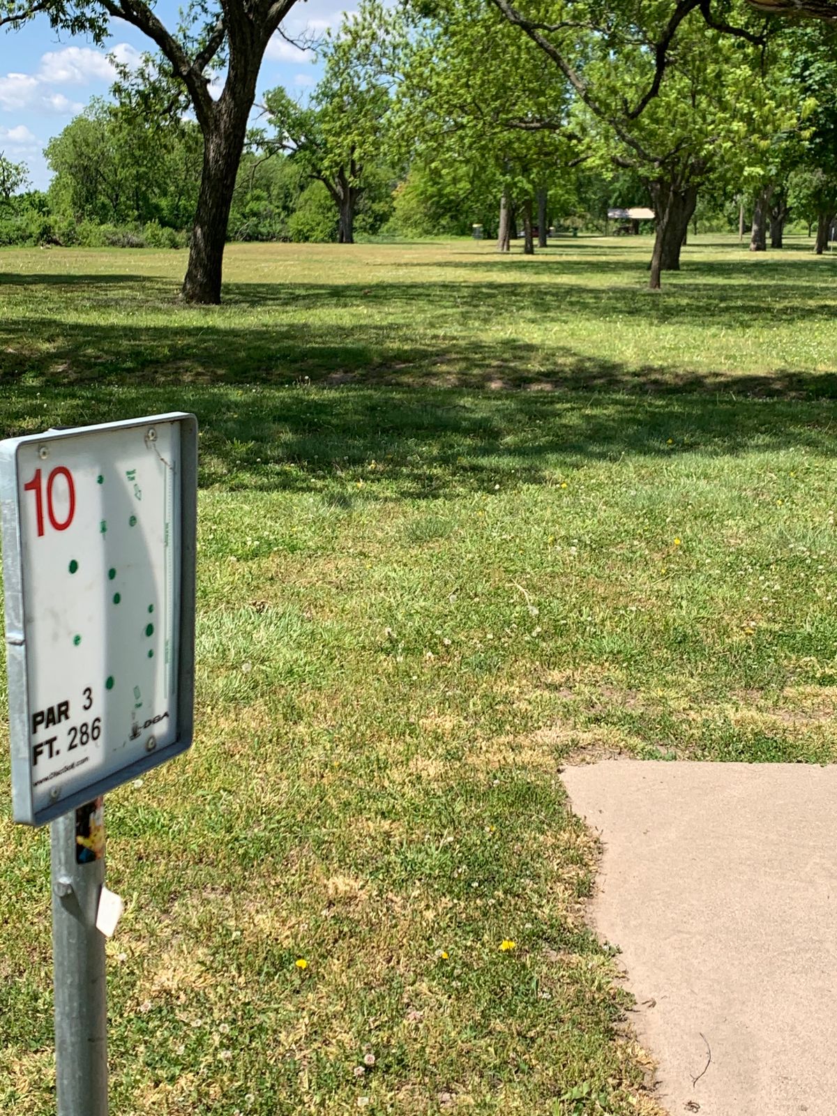 10 down fairway from pad. Water on left should not be in play.