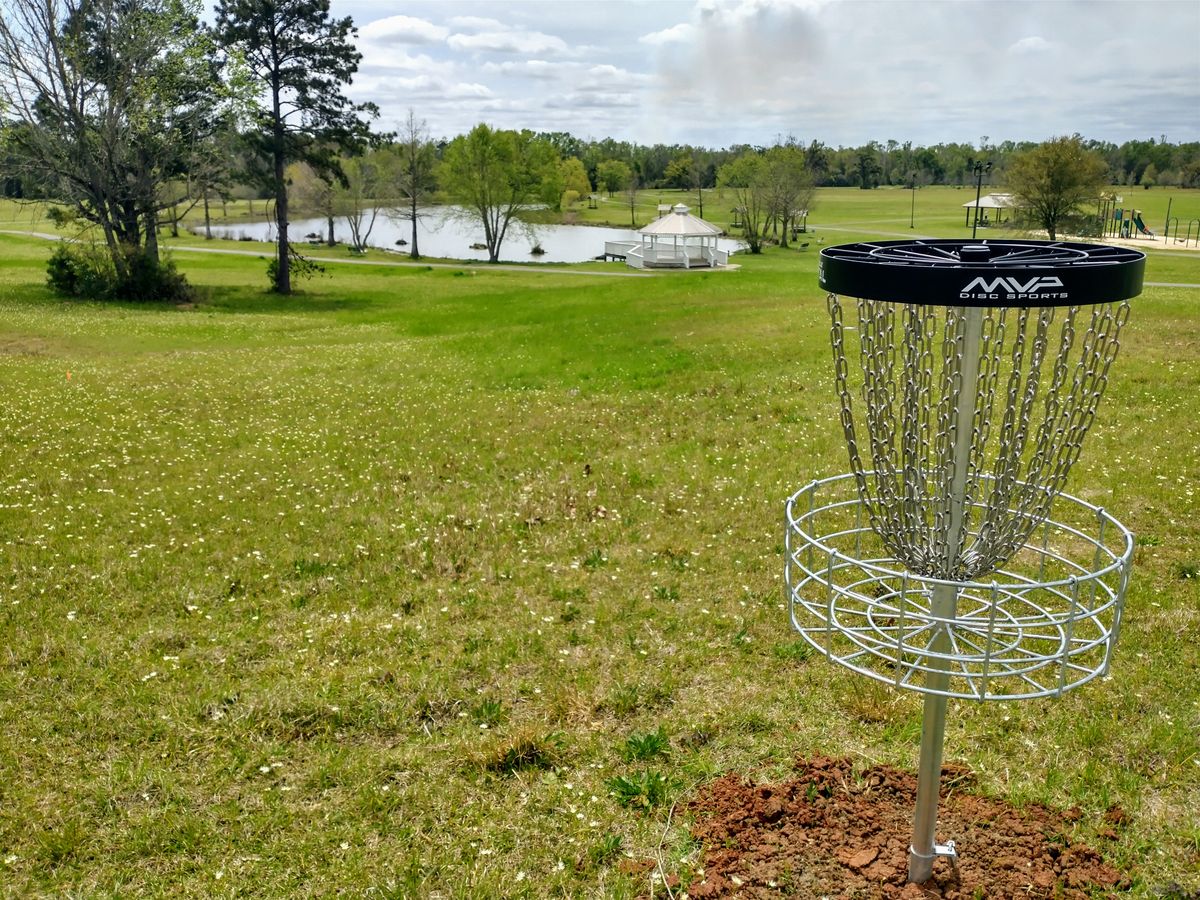 Long basket for hole 6 with a view towards the pond