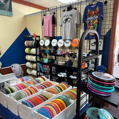 Used bins and par on branded merchandise. Board games and starter kits.