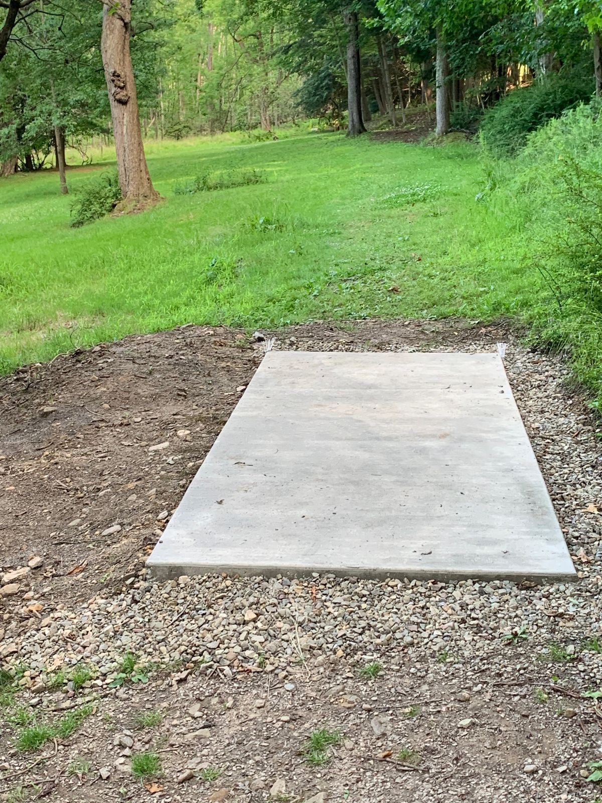 New concrete tee pads! I LOVE this course. Baskets can be hard to see.