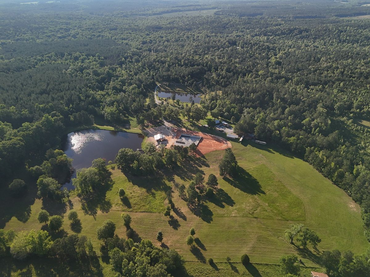 Aerial / Drone shot of the back 9 with most of the front 9 in the distance.