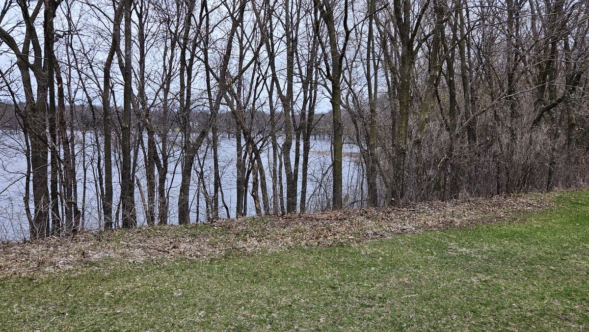 From the 7th fairway looking down into parking area and lower elevation holes all under water during 2023 flooding.