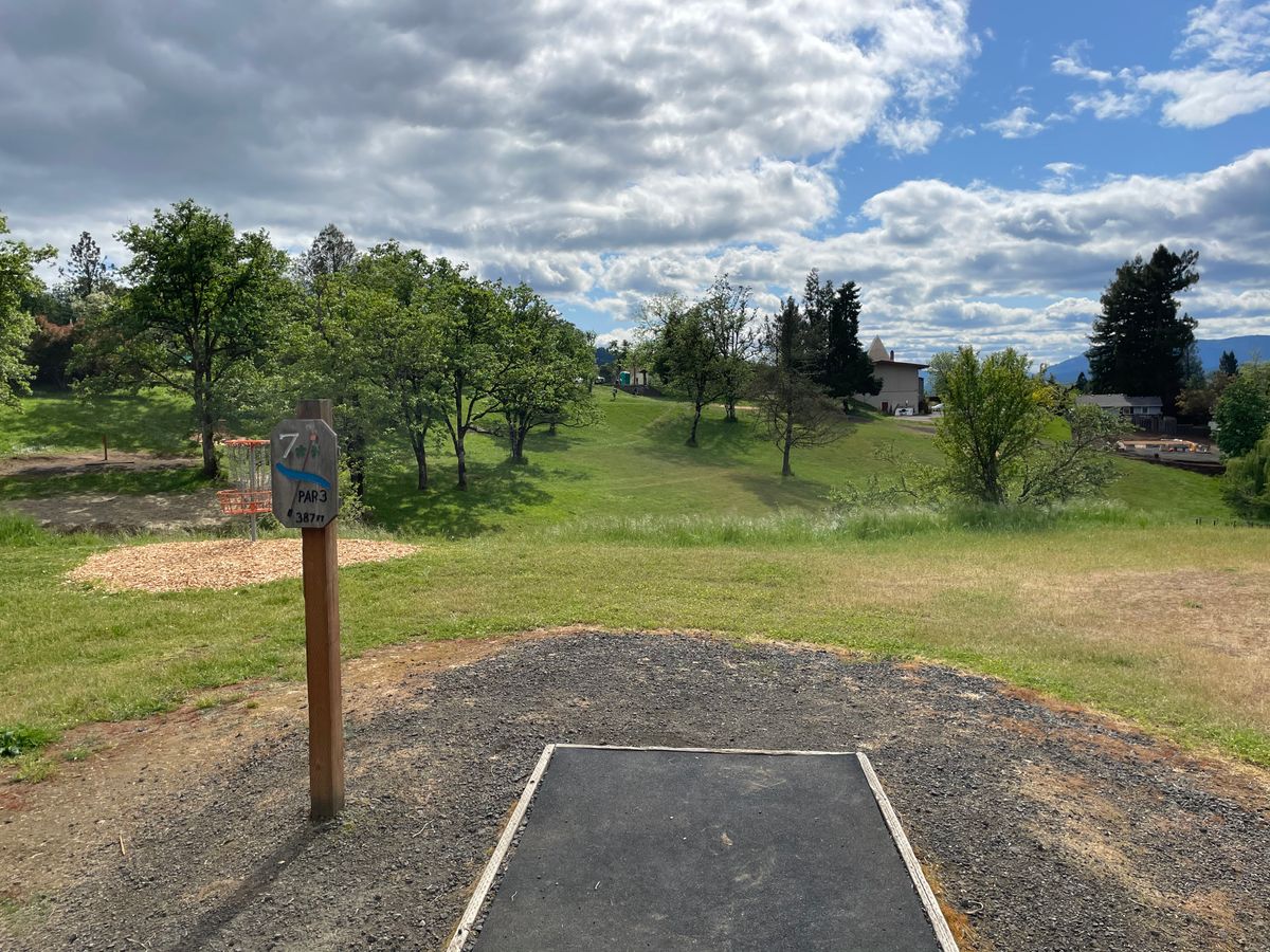 Hole 7 tee pad looking out towards the basket.