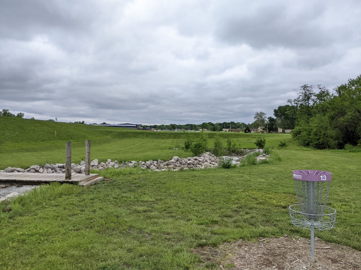 Hole 13 basket to tee view