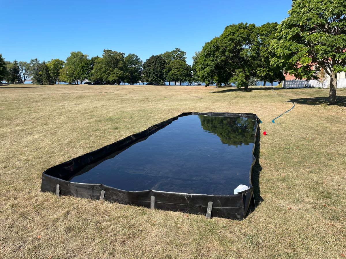 Temporary water obstacle on 5 red tees.