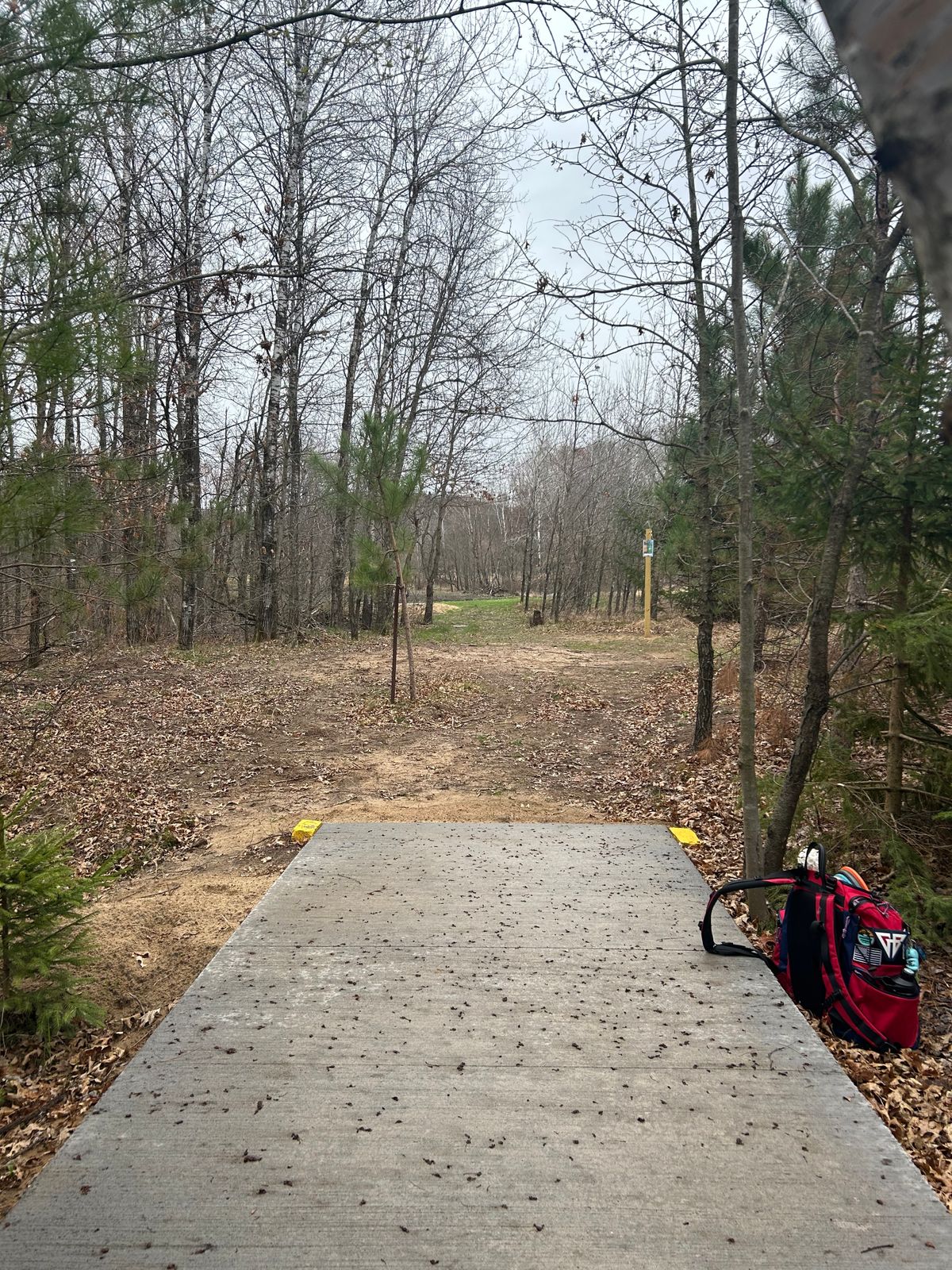 Hole 8 tee shot, tight tricky tunnel leading to carry over pond