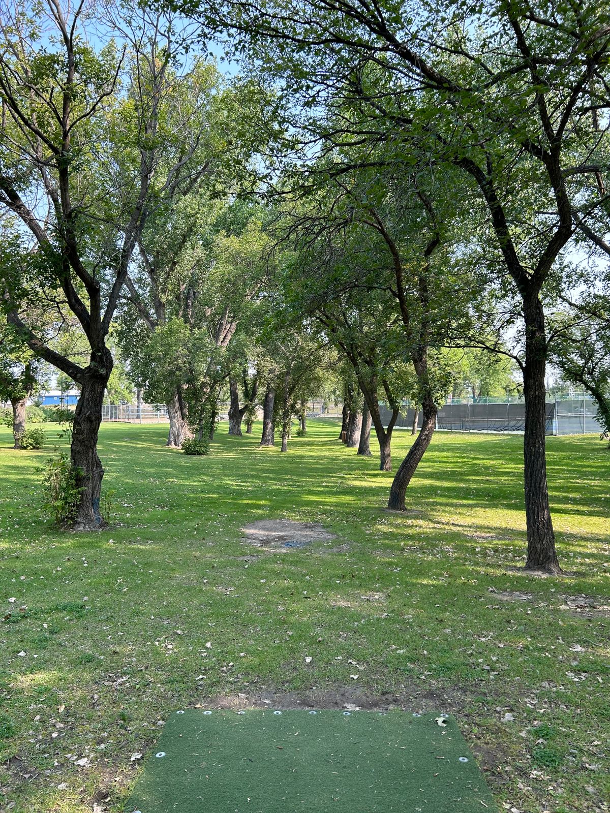 Hole 18 - OB is over the tennis court fence