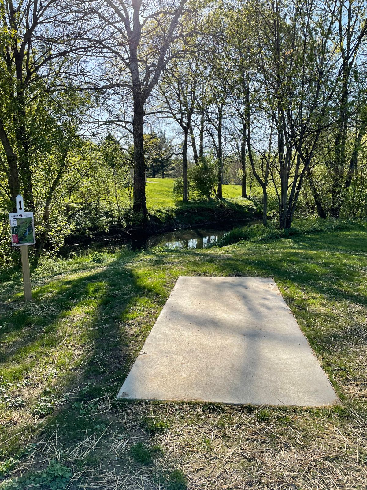 Hole 1 from the White tee…cross the creek shot to start your round.