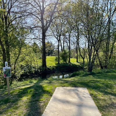 Hole 1 from the White tee…cross the creek shot to start your round.
