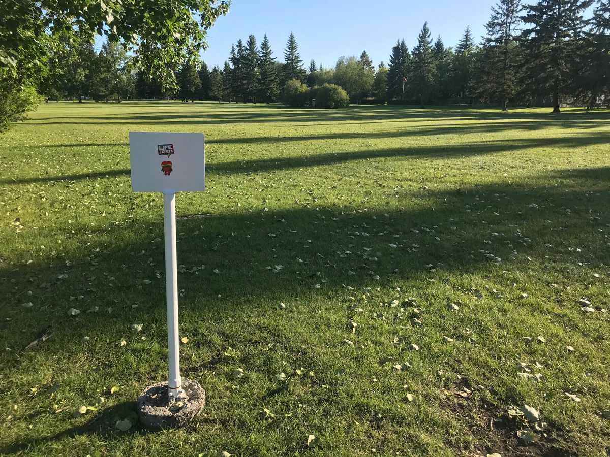 Hole 1 tee pad (sign is backwards)
