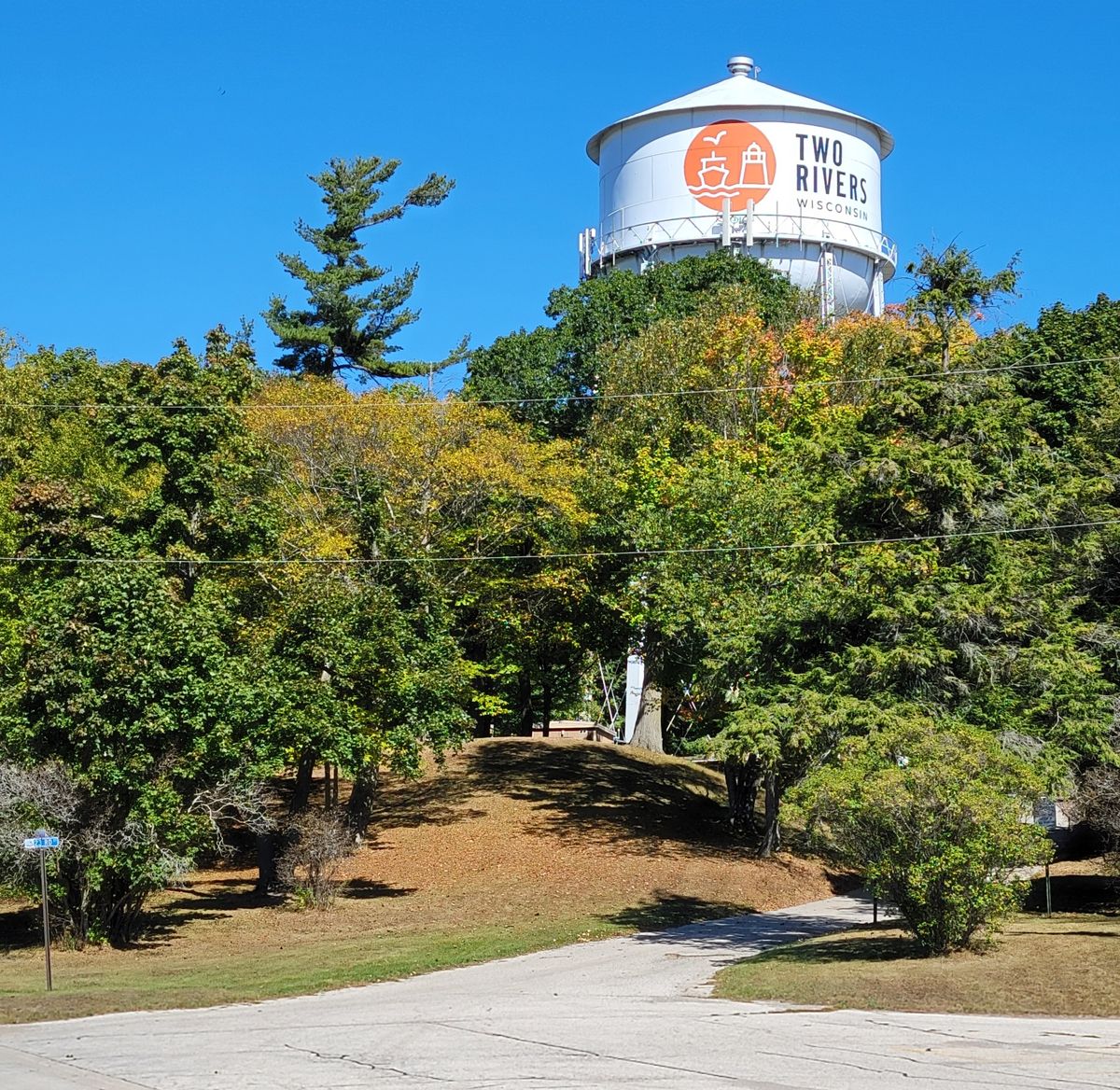 Hole 1, basket is just left of the water tower.