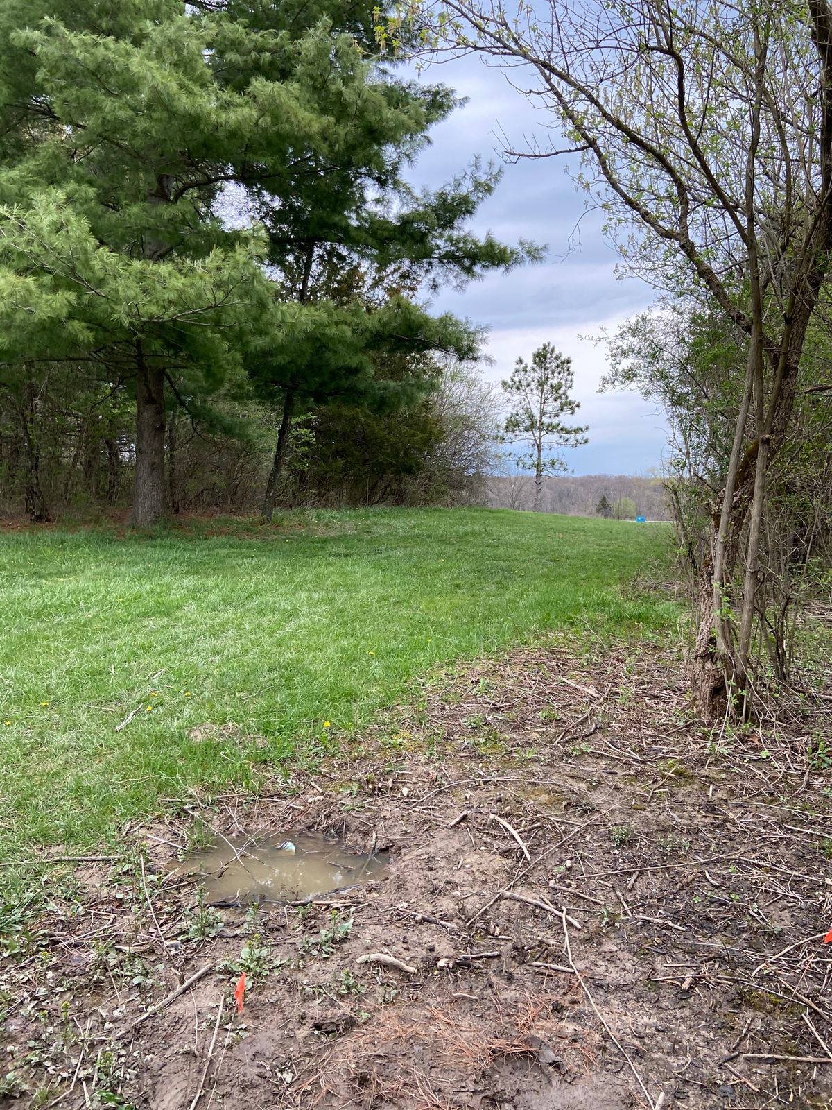 Tee of hole 16. 234 foot dogleg right. Currently a dirt pad as it’s a new hole.