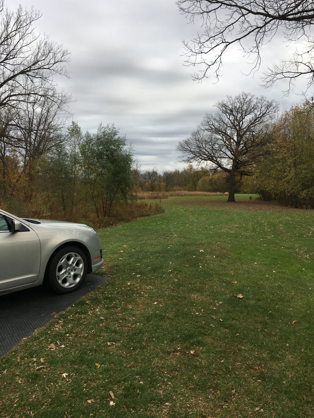 Someone parked on the tee pad.