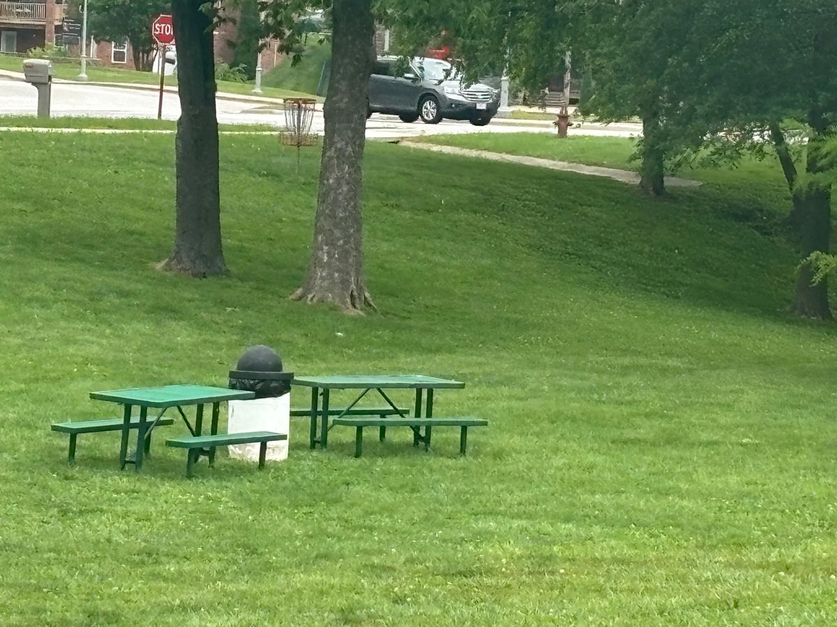 Hole 16.  Picnic bench dead center of fairway.
