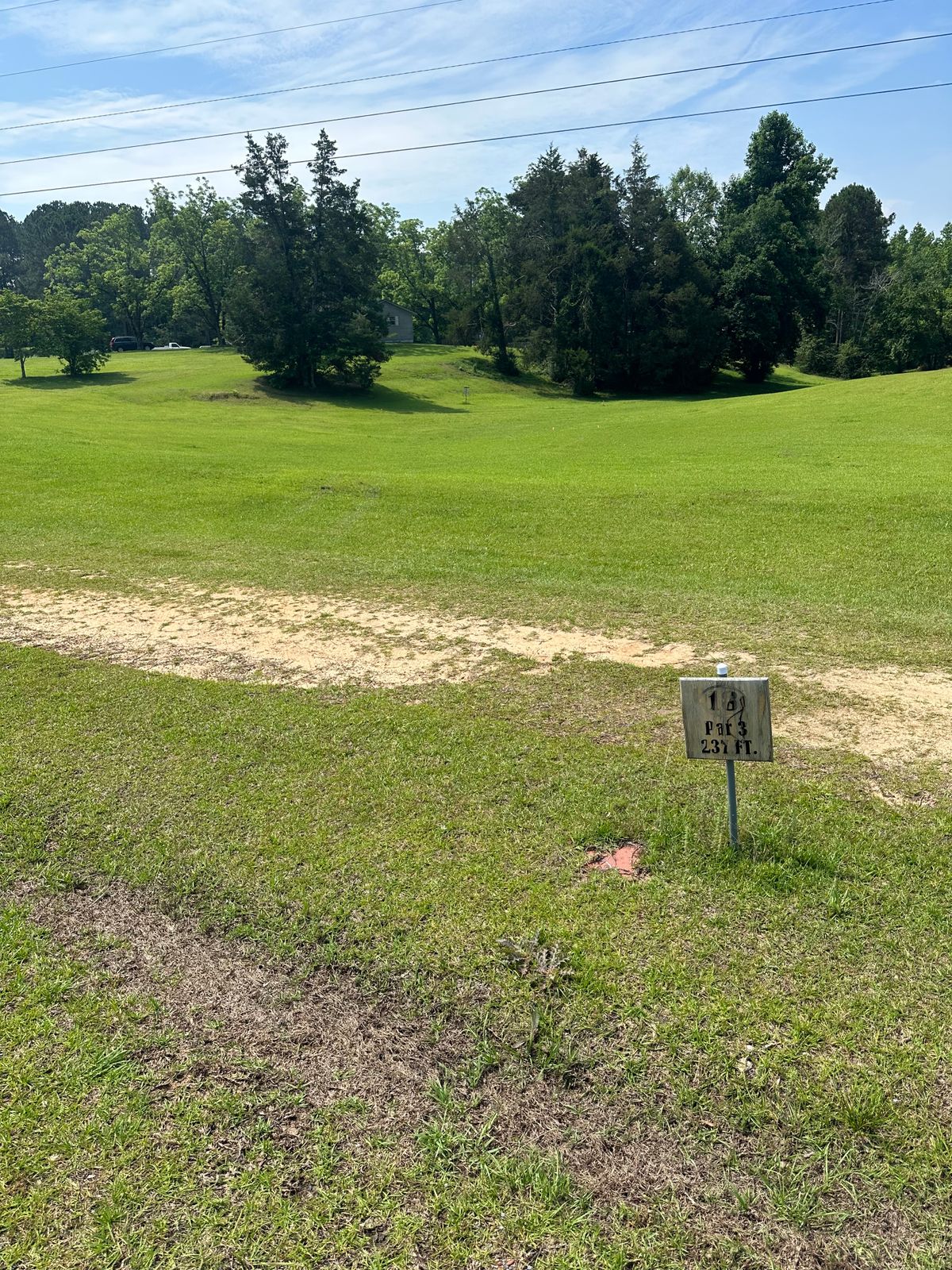 Hole 18 long tee throw from road also a island green