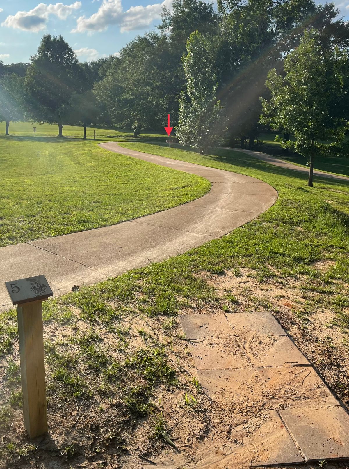 Hole 5. Pavement and beyond is OB.