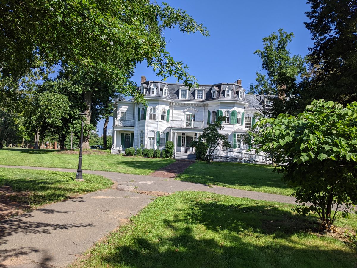 Campus building beside hole 1 tee pad